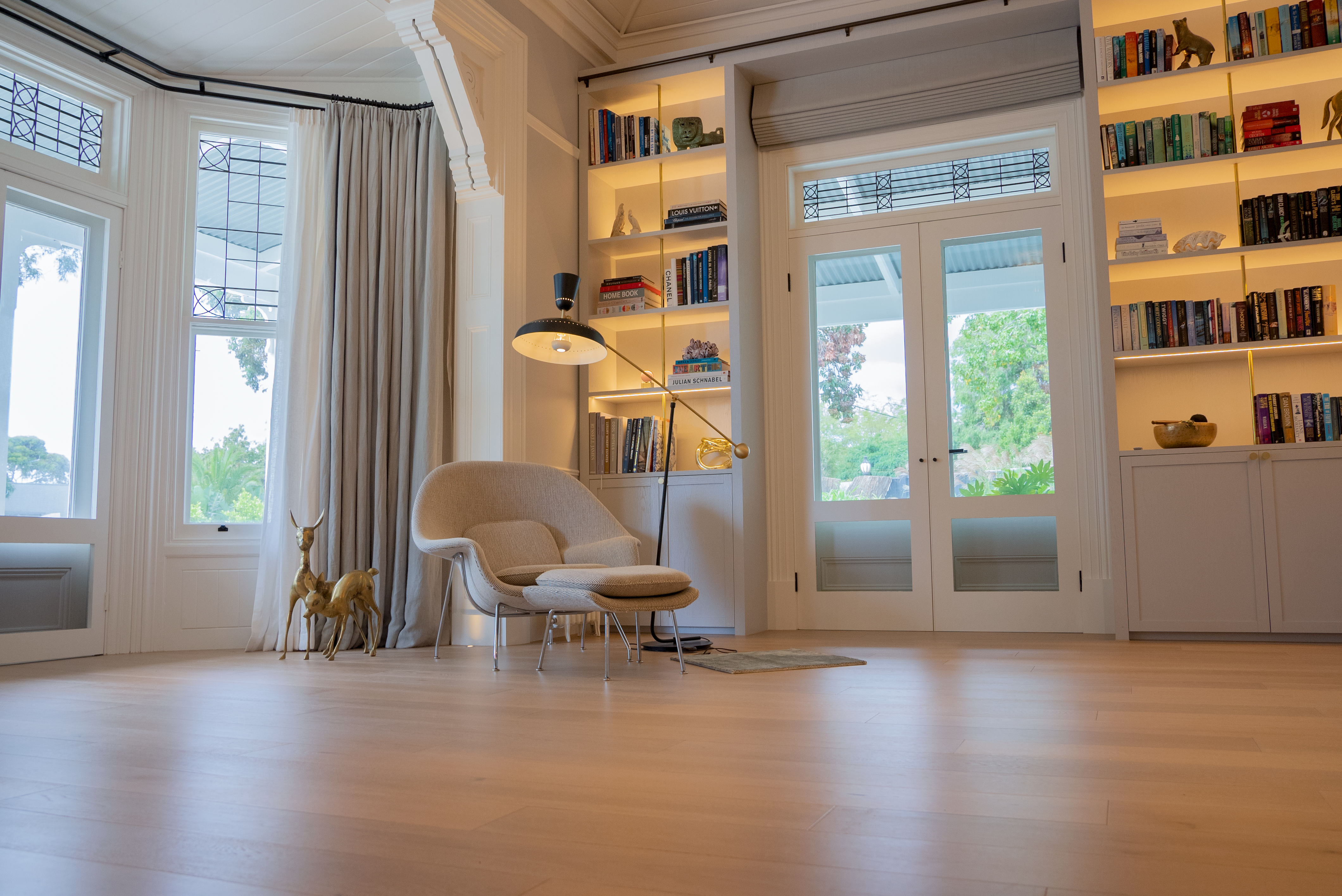 Dawn House &mdash; library with built-in bookshelves and marble fireplace