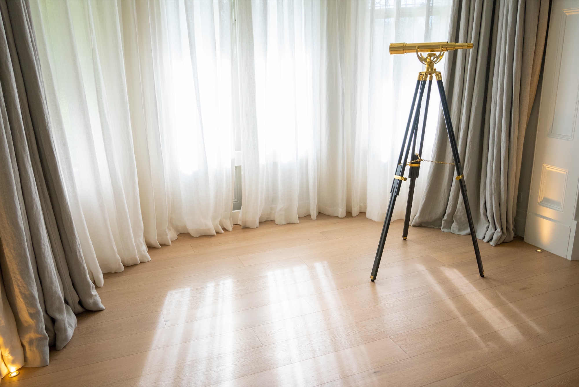 Dawn House &mdash; restored heritage room with natural light on oak