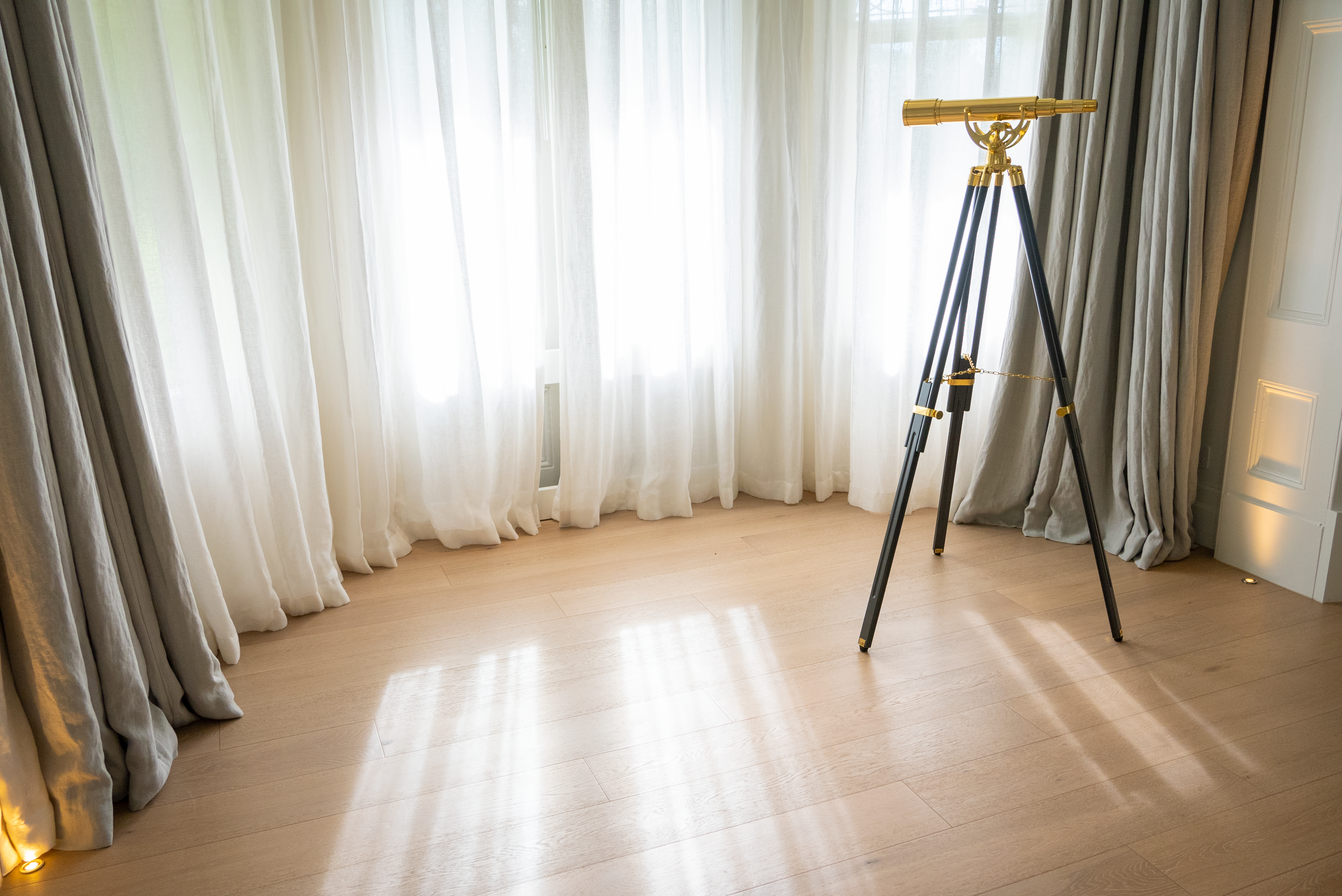 Dawn House &mdash; restored heritage room with natural light on oak