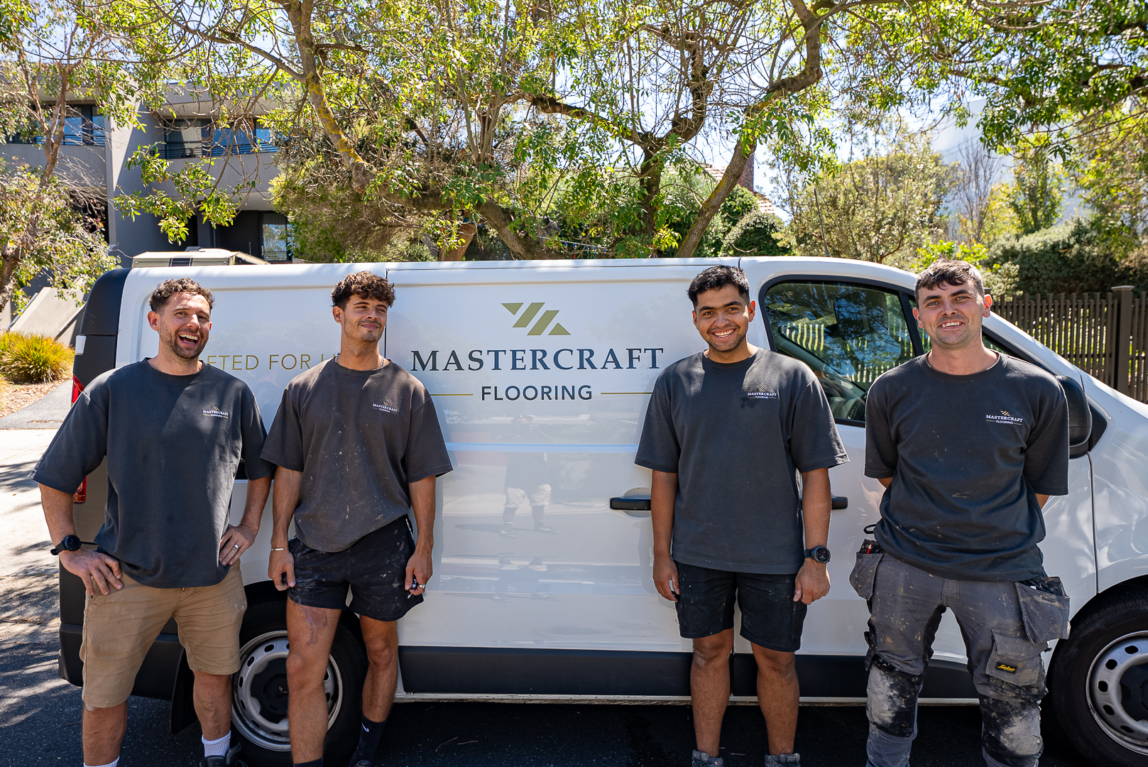 The Mastercraft Flooring team with the company van